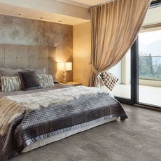Luxury vinyl flooring in bedroom | Colonial Interiors