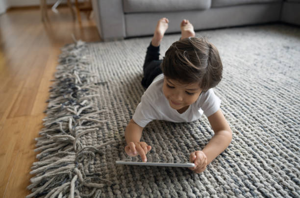 Girl lying on rug | Colonial Interiors